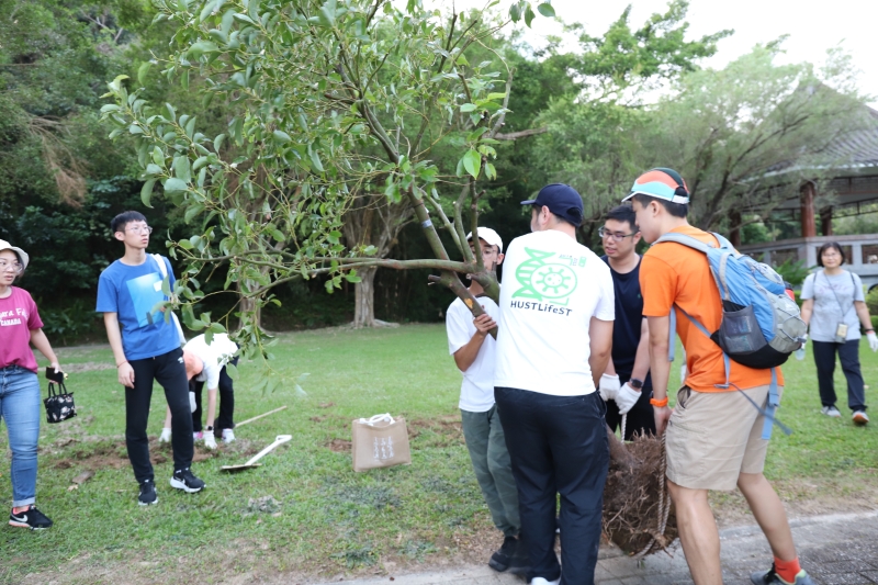 As a symbolic gesture, each participant signed their name on the saplings.